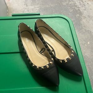 Black studded slip on